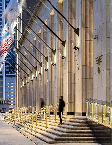 A person standing on a staircase.